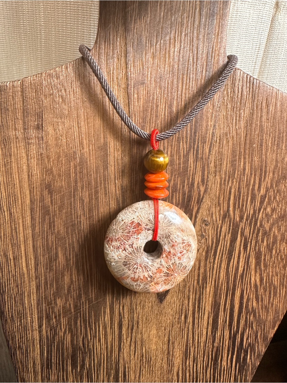 Handcrafted Red and Brown Coral Fossil Donut Pendant Necklace on Brown Rope - Picture 7 of 16